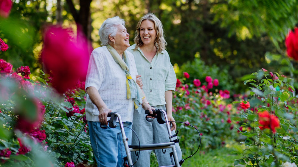 Home Care Service Patient and Provider going on a walk